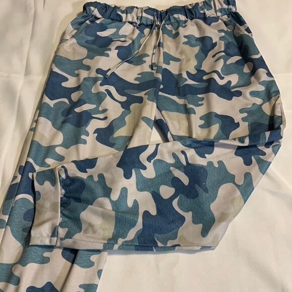 Size LARGE blue/gray camouflage joggers. 95% poly and 5% spandex. Very stretchy - Picture 1 of 10